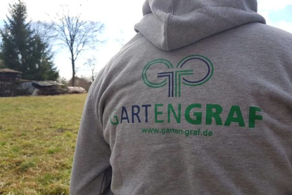 Siebdruck von Logo auf Hoodie Rückseite